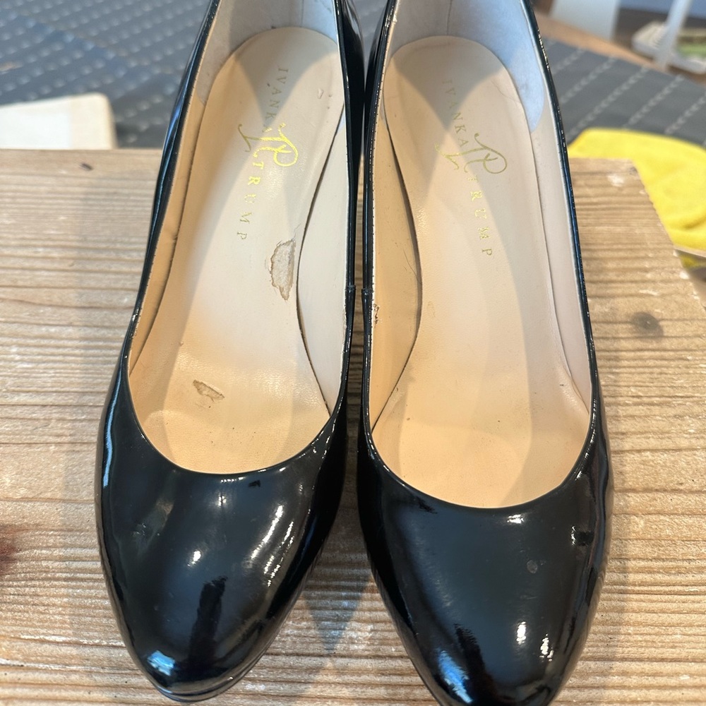 Ivanka Trump black patent leather heels, min wear .Exterior like new.